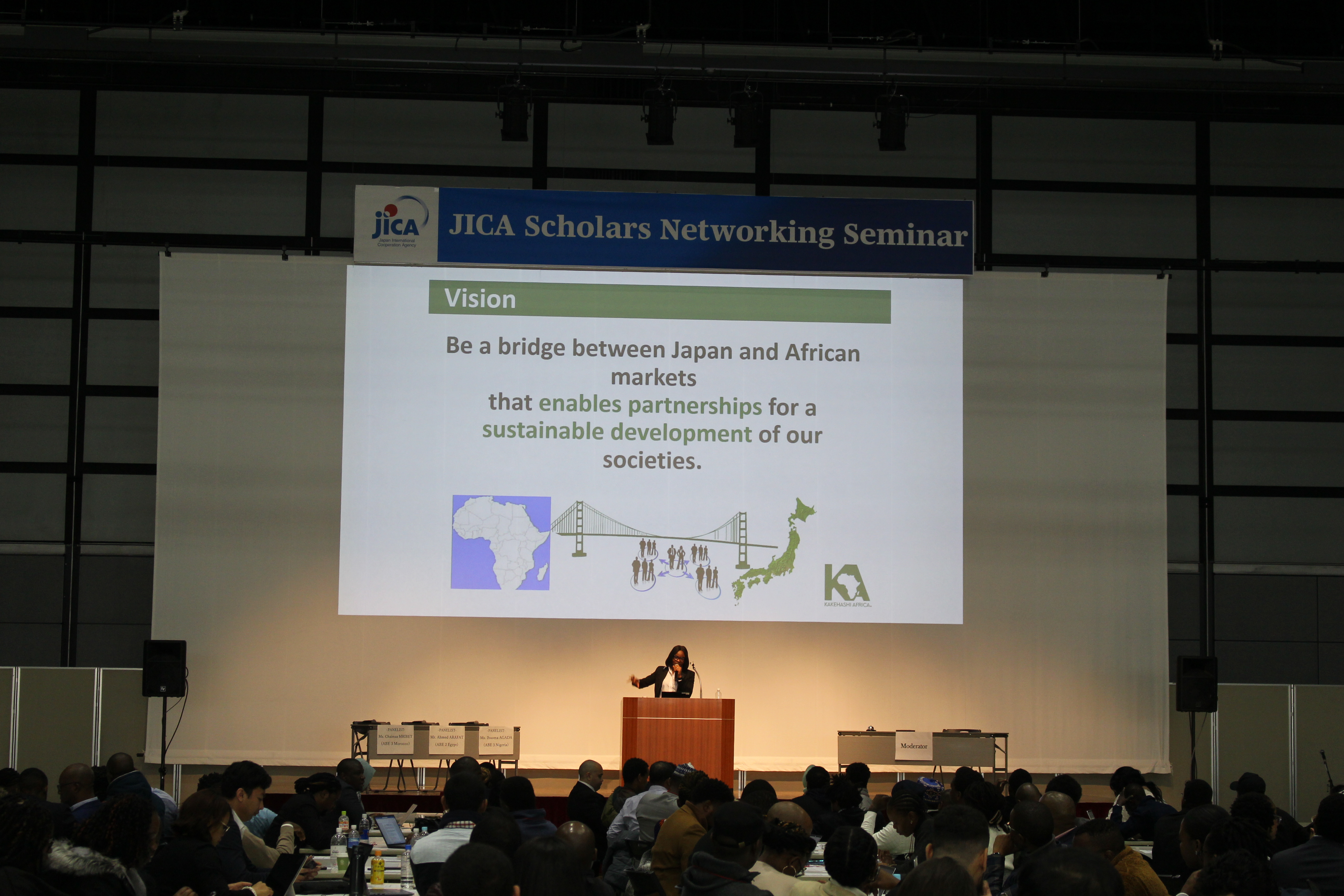 (Ms. Ms. Ihuoma Nkechi AGADA explains the foundation history of Kakehashi Africa (KA)’s, aims and present activity added with contact address of the offices in each region.)
