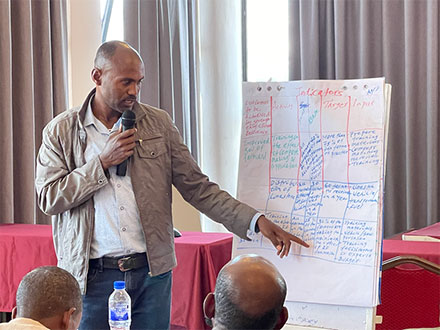 One of the participants delivering presentation based on the group discussions.