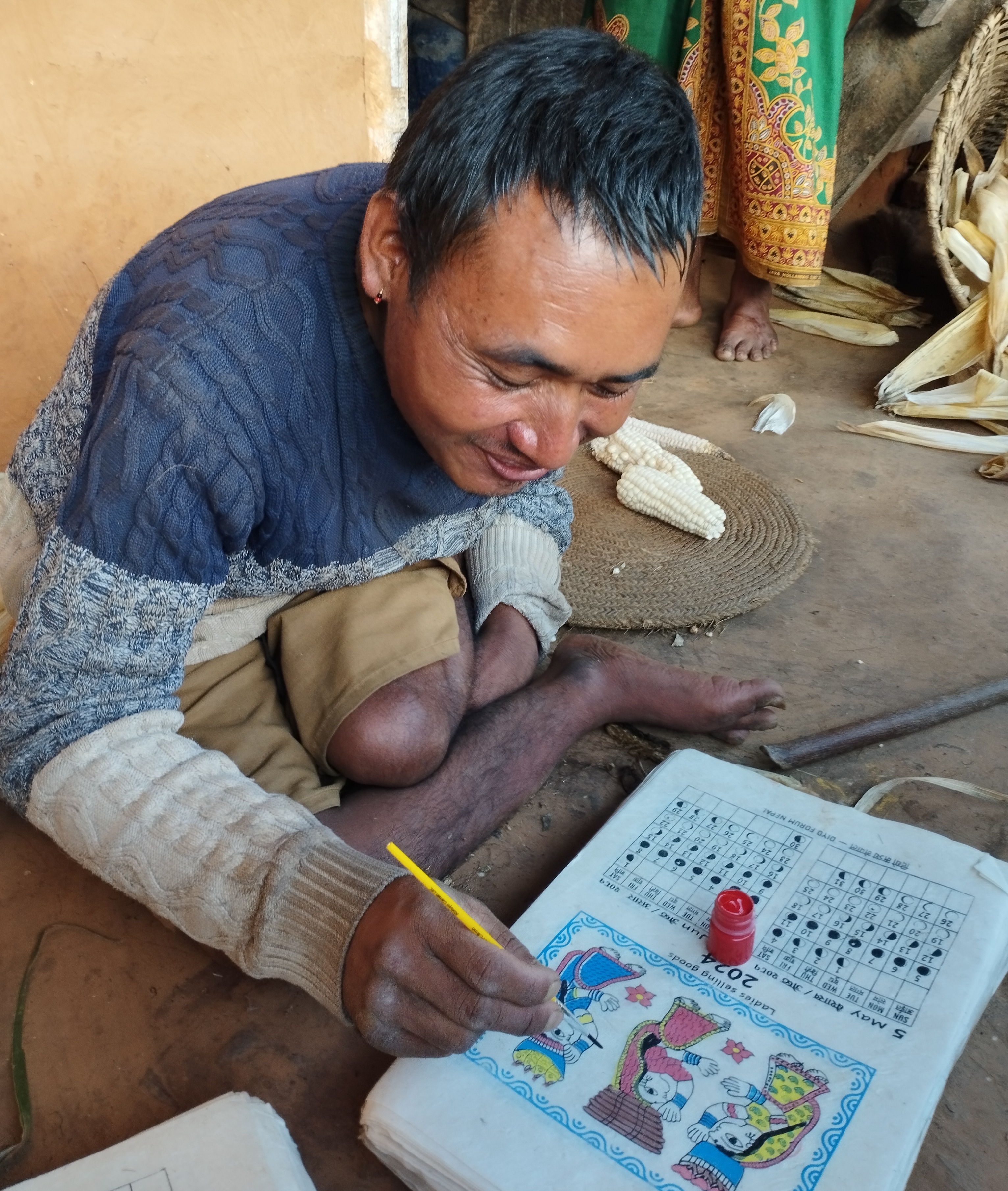 障害のある方が手彩色するカレンダー制作の様子