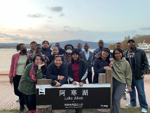 A commemorative photograph captured at the shore of Lake Akan