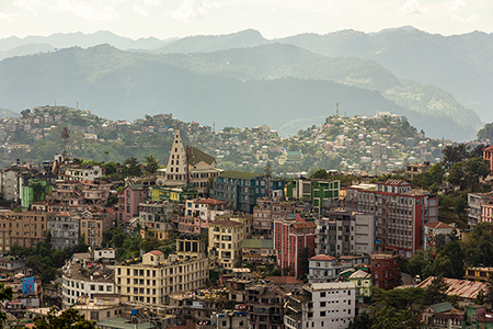 Buildings clustered on a mountain ridge