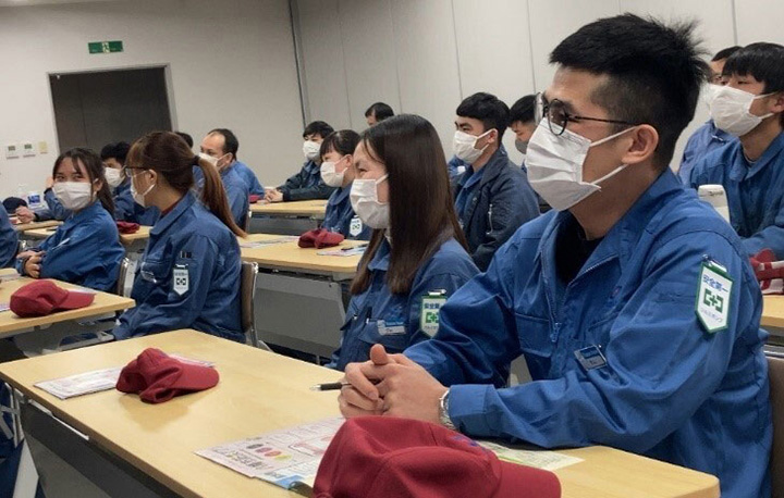 Vietnamese workers attending a disaster prevention training session