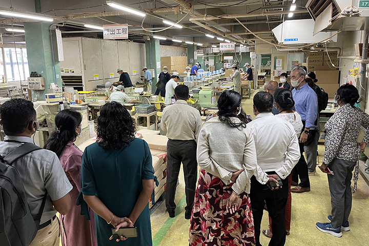 An inspection team from Sri Lanka touring Nihon Rikagaku Industry Co., Ltd..