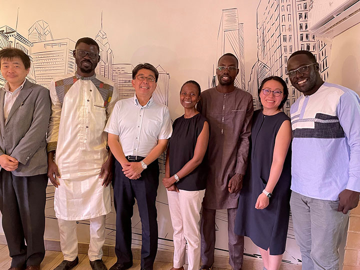 Mr. Yanase with ABE Initiative alumni. He heard that they would like to work for Japanese companies, while facing difficulties due to high level Japanese language requirement by Japanese companies. Photo taken in Senegal in June 2023.