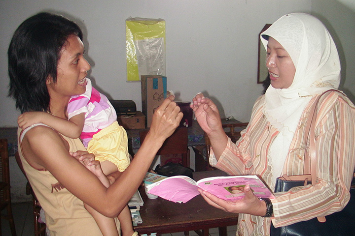 Dr. Pritasari and a mother