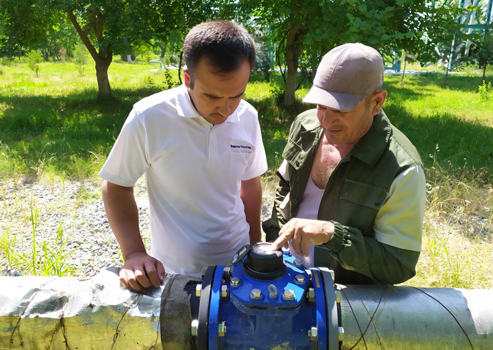 Technicians receiving maintenance training on the water meter system. 
