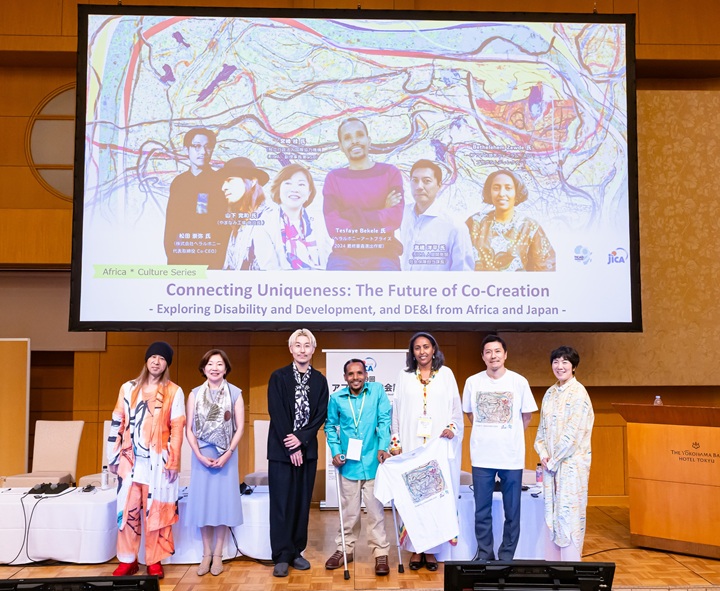 Photo: Speakers at the Diversity (Disability Mainstreaming, Art) Thematic Event.  Center: Ethiopian artist Mr. Tesfaye Bekele Beli (Photo: JICA)