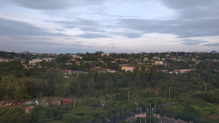 Photo: The cityscape of Kigali, the capital of Rwanda. Lush, green, and nestled between the hilly Rwandan landscape, the city center has a tranquil and peaceful atmosphere distinctive of “The Land of a Thousand Hills”. 
