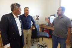 Surin (left) talks with students at E-JUST