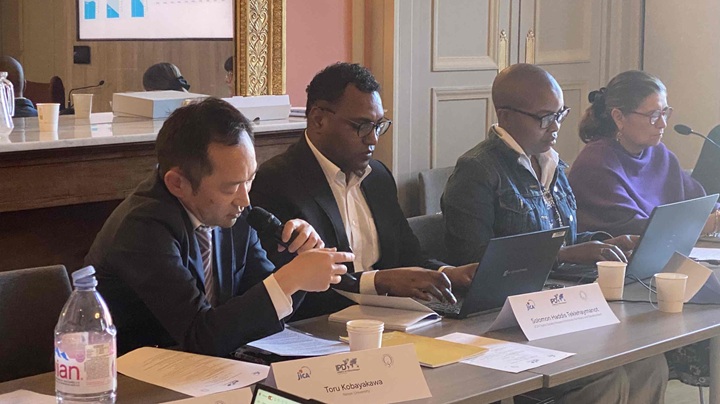 Photo: Visiting Fellow Kobayakawa Toru (far left) presents his findings during the session, with Research Fellow Solomon Haddis Teklehaymanot seated next to him (right).