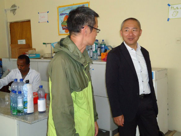 Mr. Isaji visiting the office of a water quality analysis volunteer in SNNPR