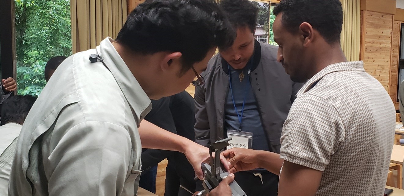 Japanese experts assisting participants with the UAVs 