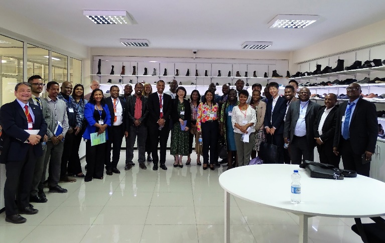 Group picture of the team that visited Anbessa Shoe Share Company 