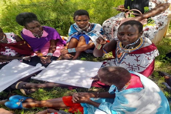 Women discussing necessary actions to address GBV.