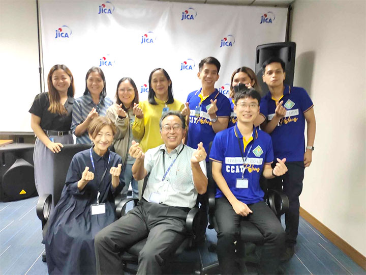 JICA Chief Representative SAKAMOTO Takema (center) with JOCVs and local counterparts.
