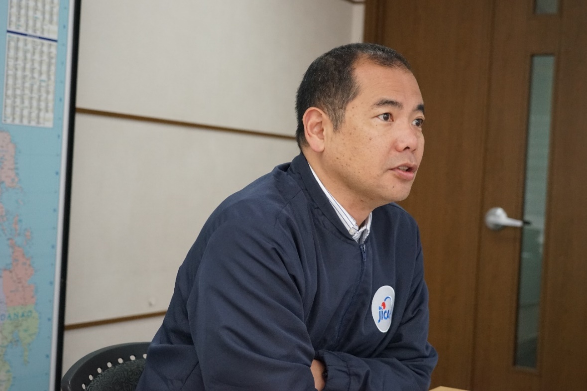 JICA Senior Representative IDE Soichiro gives his remarks during the meeting with the KIZUNA and Energy Policy Scholars.