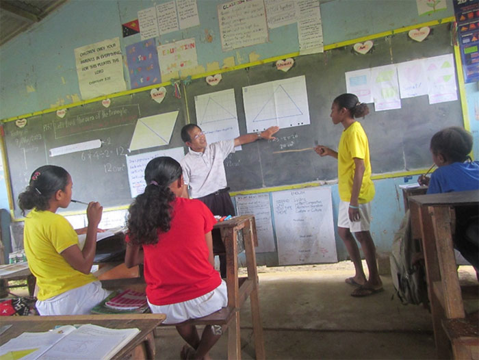 Mr. Todaka teaching math at class