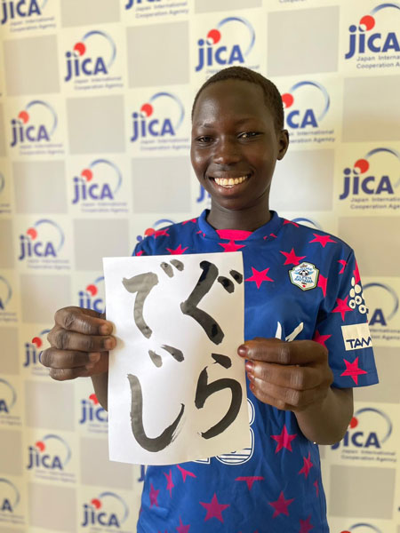 Smiling with her name written with Shuji, Japanese traditional stationary