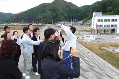 Thai administrative officials receive training at a site destroyed by the  Great East Japan earthquake 