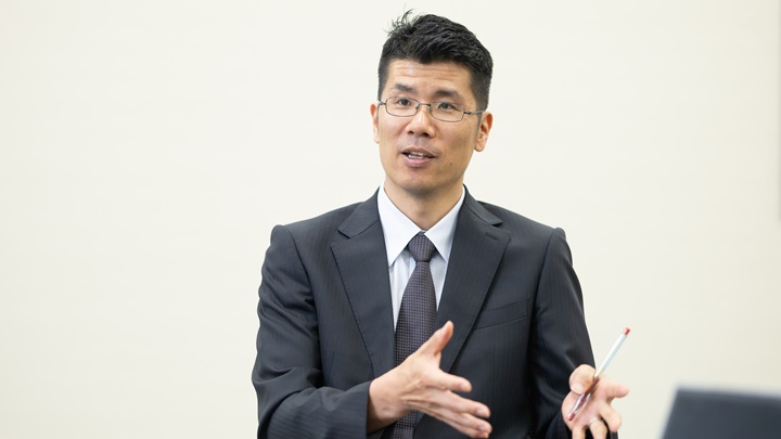 写真：JICA緒方貞子平和開発研究所の桂井太郎主任研究員