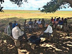 MOReDeP Japanese experts discussing with rice farmers
