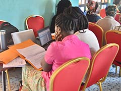 County officer checked data on forms filled by farmers and transcribed them to datasheet.