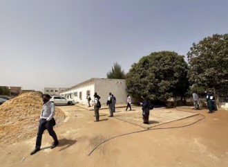 本プロジェクト建設予定地（北側より撮影） 写真中央の外科病棟は先方負担により解体・撤去予定