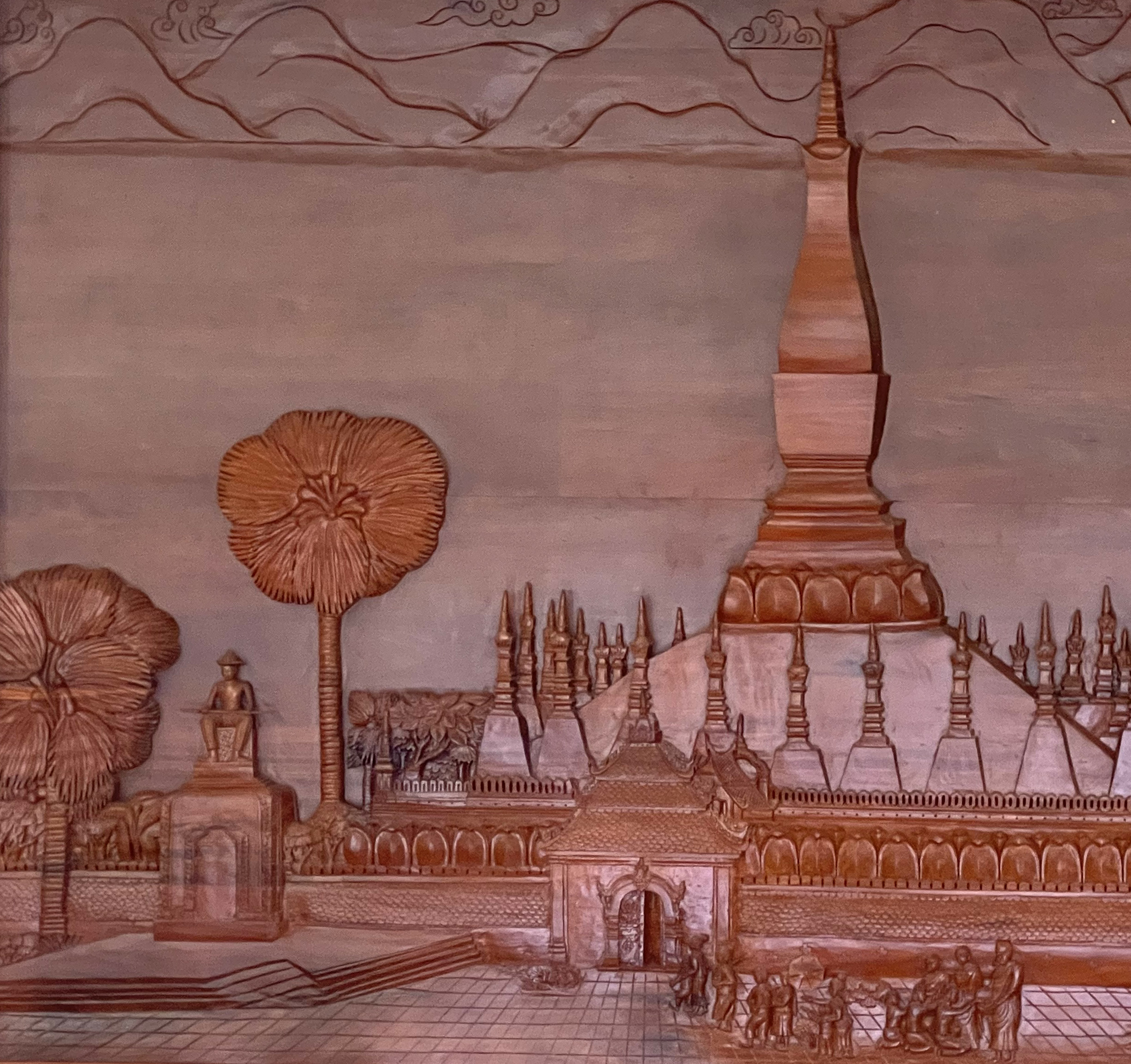 02 King Setthathirath and That Luang carved on wood
