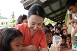 Rie Mitsutaka ( Nursing) demonstrates proper handwashing to children in San Isidro